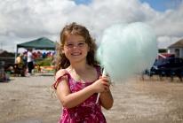 Kensa holds up her huge blue candy floss at Hayle Celebration Day 2016 Kensa holds up her huge blue candy floss at Hayle Celebration Day 2016